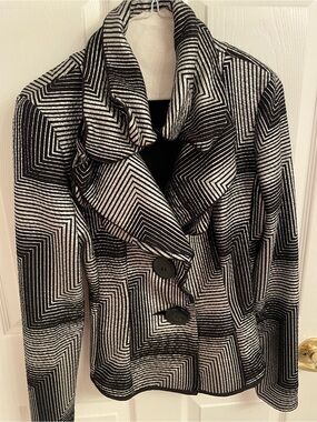Joseph Ribkoff black and white geometric pattern jacket.